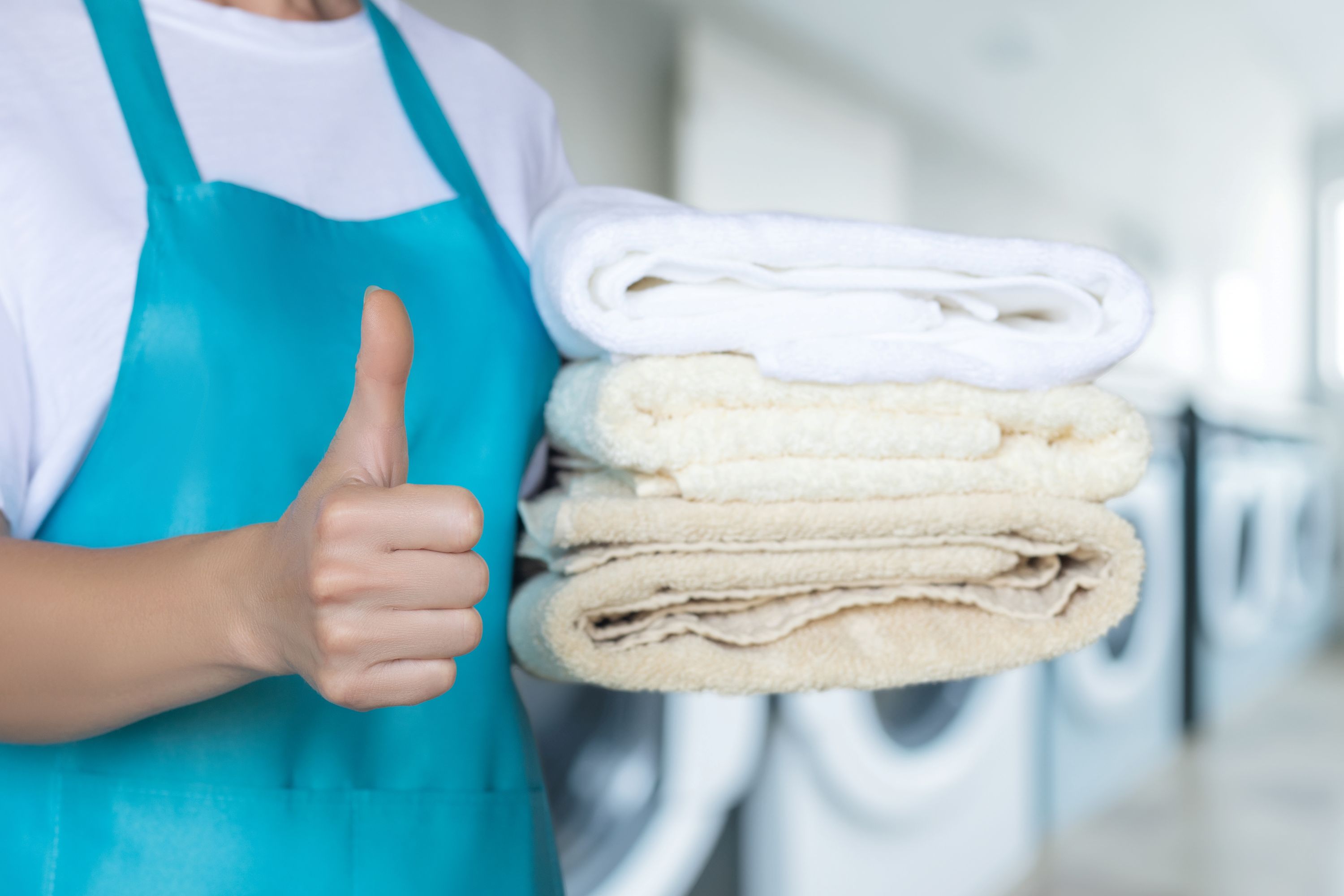 Laundry Worker Shutterstock 2494014651